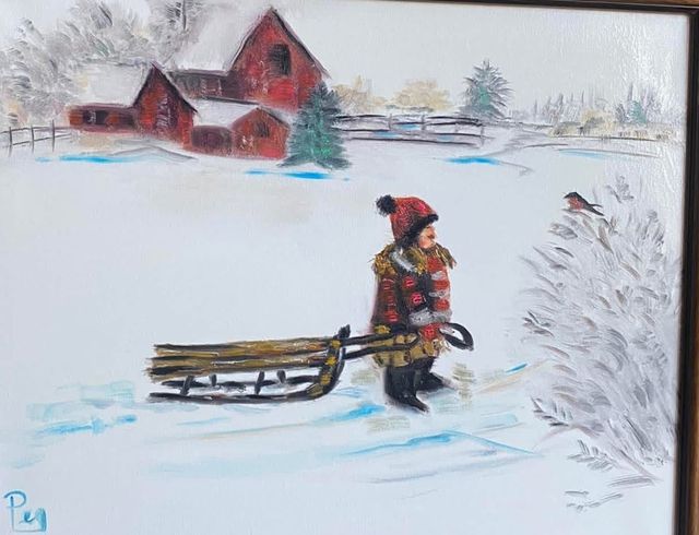 A child pulling a wooden sled through snow past a red barn